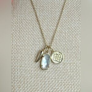 Kendra Scott Dira gold coin charm necklace ivory mother of pearl toggle clasp